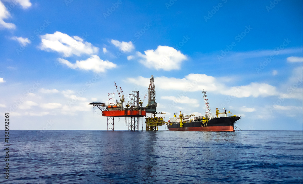 Oil and gas background picture with clear blue sky.