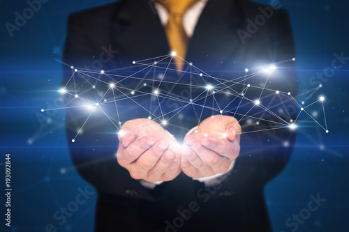 Businessman holding network connections
