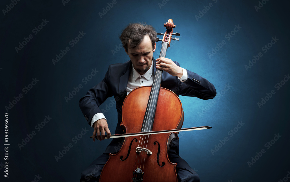 Cellist playing on instrument with empathy