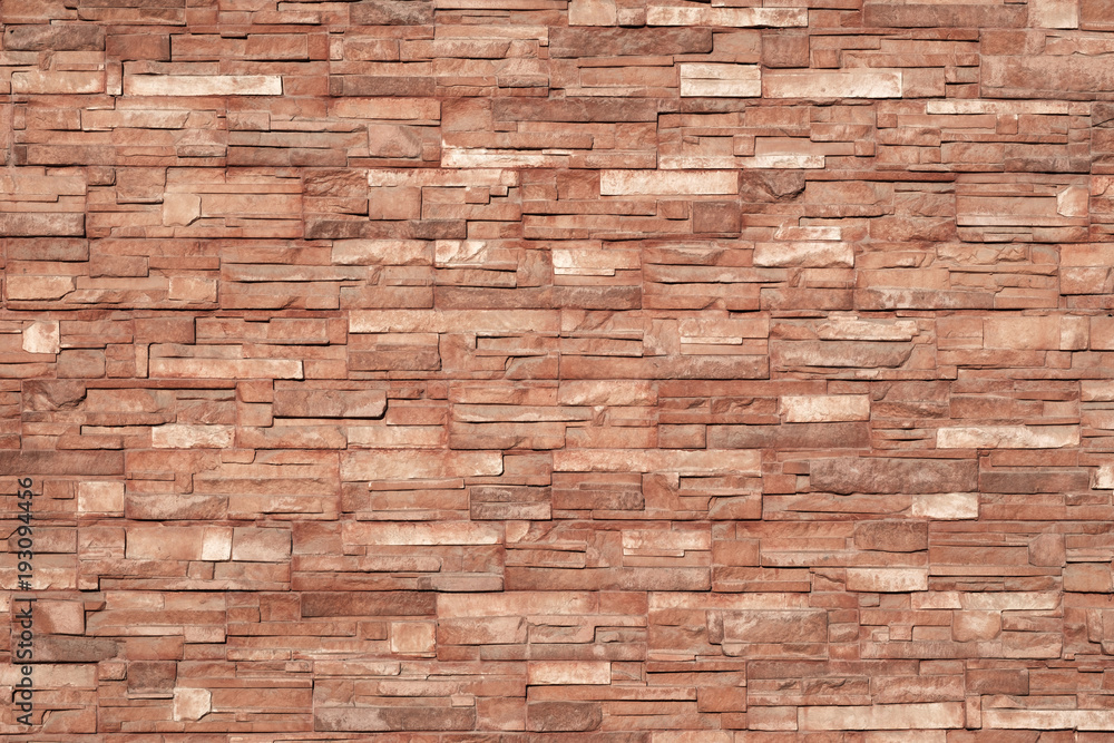 brownish texture of ceramic tiles glued to the outside of the building, bright color brownish texture of ceramic tiles glued to the outside of the building, bright color