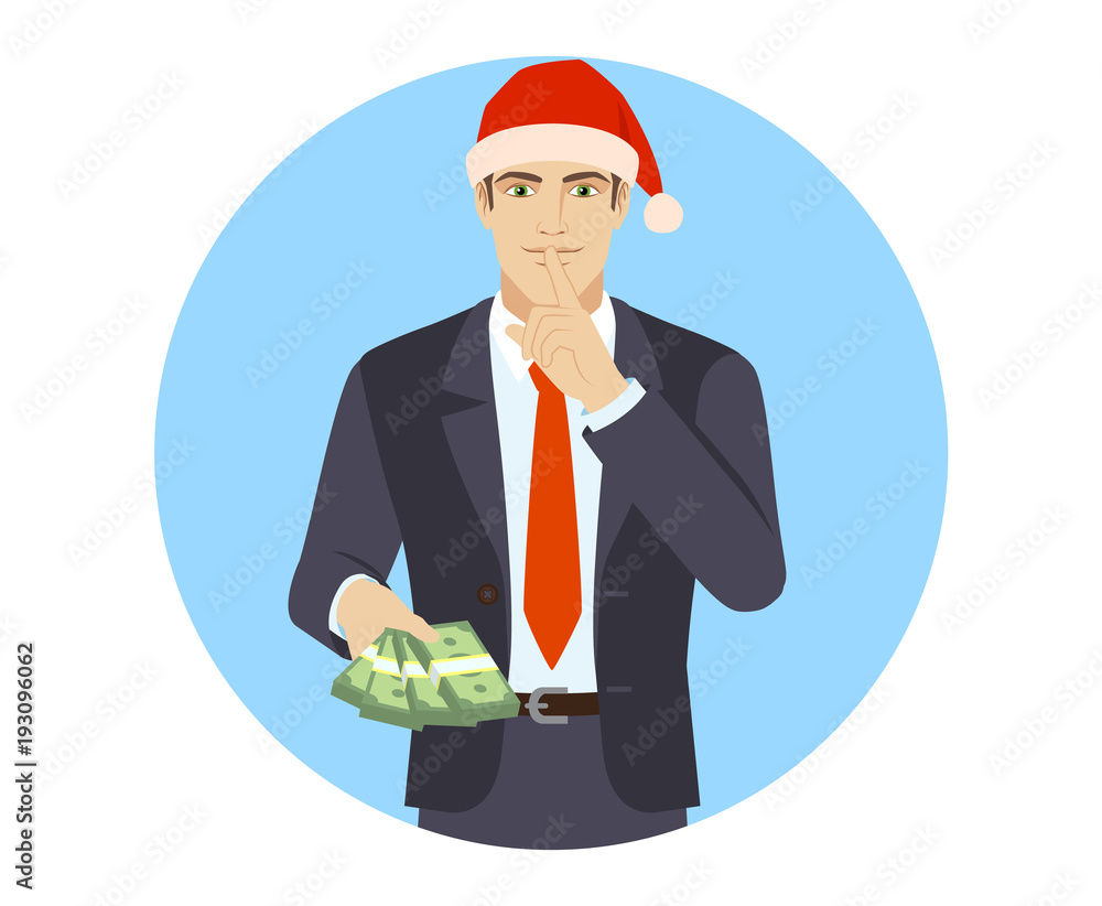 Businessman in Santa hat with money making hush sign Businessman in Santa hat with money making hush sign