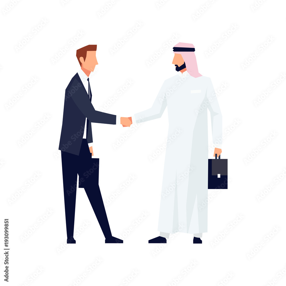 Businessmen shake hands.