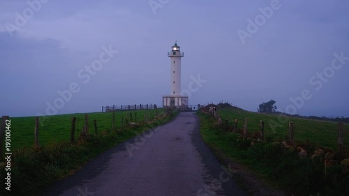 Faro de Lastres. Lastres lighthouse at twilight, Spain