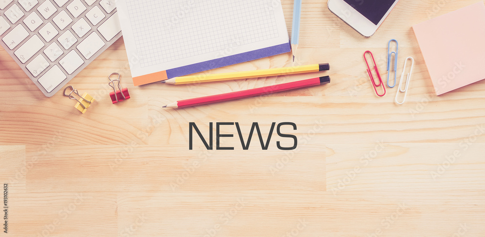 Business Workplace with NEWS Concept on Wooden Background Business Workplace with NEWS Concept on Wooden Background