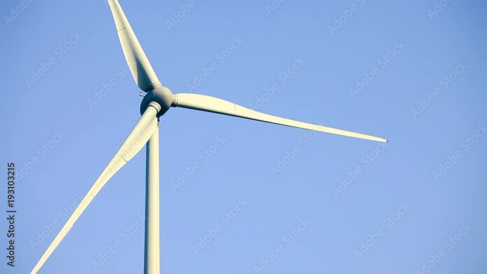 Wind turbines create renewable energy at the rural countryside landscape Wind turbines create renewable energy at the rural countryside landscape