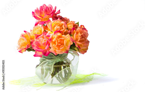Fototapeta Naklejka Na Ścianę i Meble -  Wild roses bouquet in glass vase