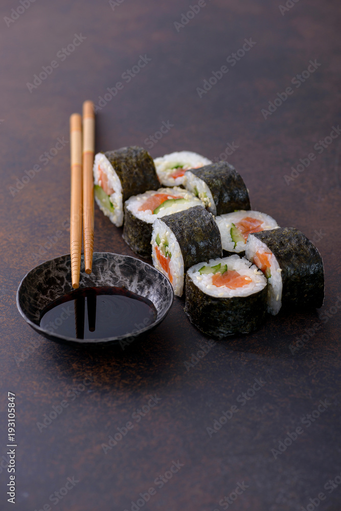 Japanese sushi roll with soy sauce Japanese sushi roll with soy sauce