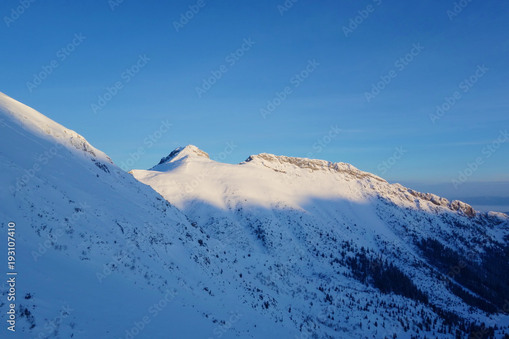 Mountain hiking trail from Hala Kondratowa to Kopa Kondracka and Giewont in winter, Zakopane, Tatry, Poland