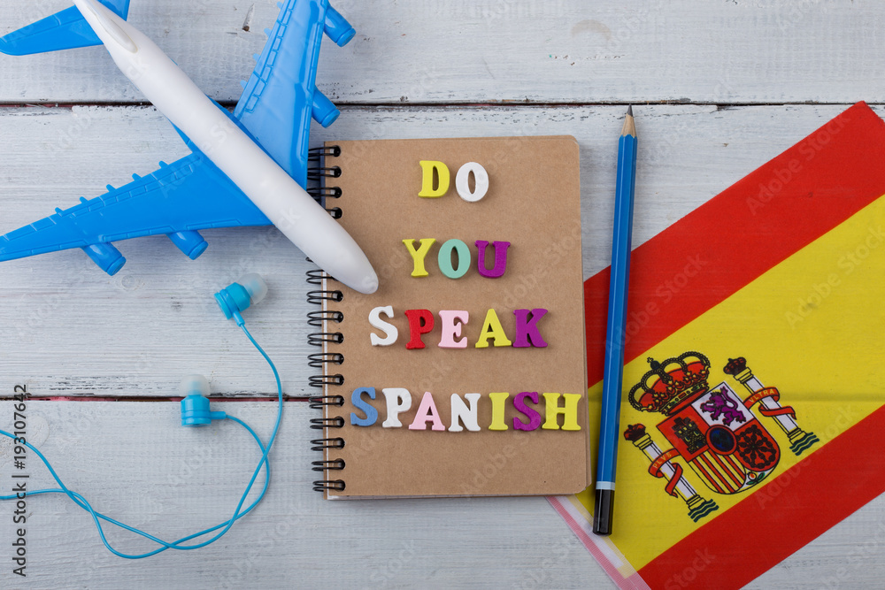 Concept of learning the spanish language colorful wooden letters with