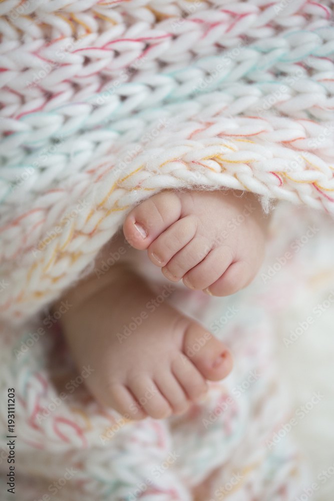 baby feet in blanket, copy space. selectiv focus baby feet in blanket, copy space. selectiv focus