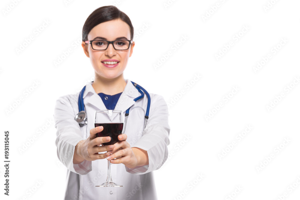 Young woman doctor with stethoscope offering wine in white uniform on white background Young woman doctor with stethoscope offering wine in white uniform on white background