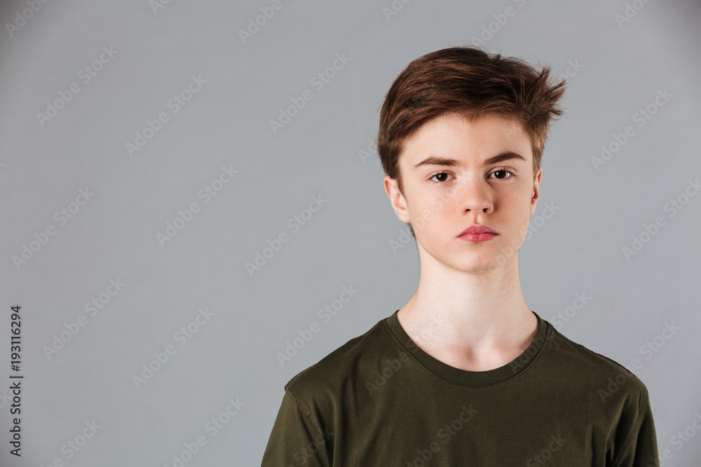 Portrait of a male teenager wearing t-shirt Portrait of a male teenager wearing t-shirt