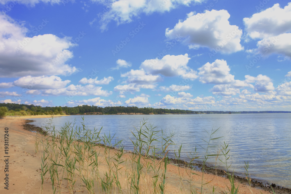 The river at College Creek in Williamsburg Virginia, sandy beach The river at College Creek in Williamsburg Virginia, sandy beach