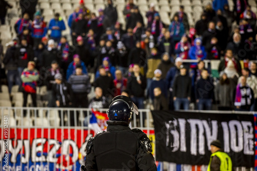 Special police unit at the stadium event secure a safe match against the hooligans