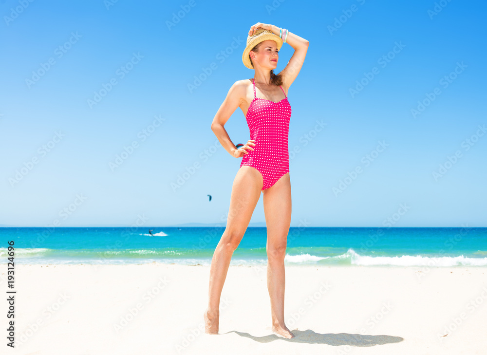 happy modern woman on seashore looking into distance happy modern woman on seashore looking into distance