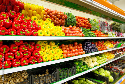 Fresh organic Vegetables and fruits on shelf in supermarket, farmers market. Healthy food concept. Vitamins and minerals. Tomatoes, capsicum, cucumbers, mushrooms, zucchini, © Irina Sokolovskaya