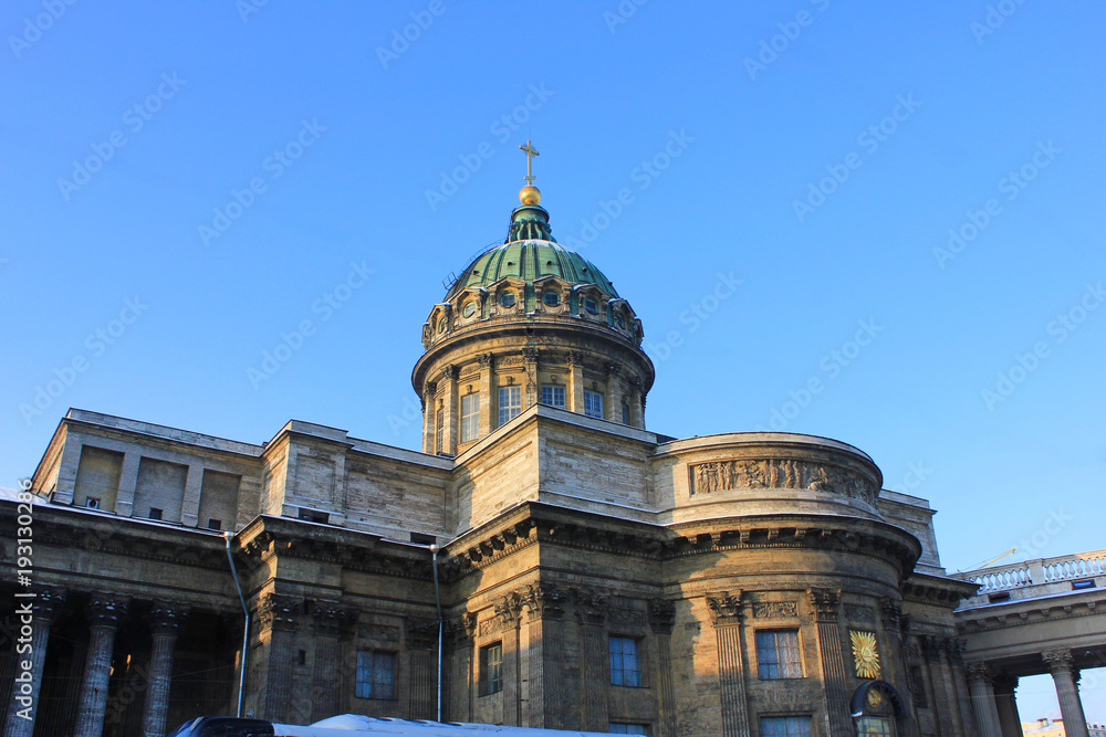Kazan Cathedral (Cathedral of Our Lady of Kazan) in St. Petersburg, Russia. Active Orthodox Cathedral and Museum on Blue Sky Background. Famous Historical City Landmark, Located on Nevsky Prospect.