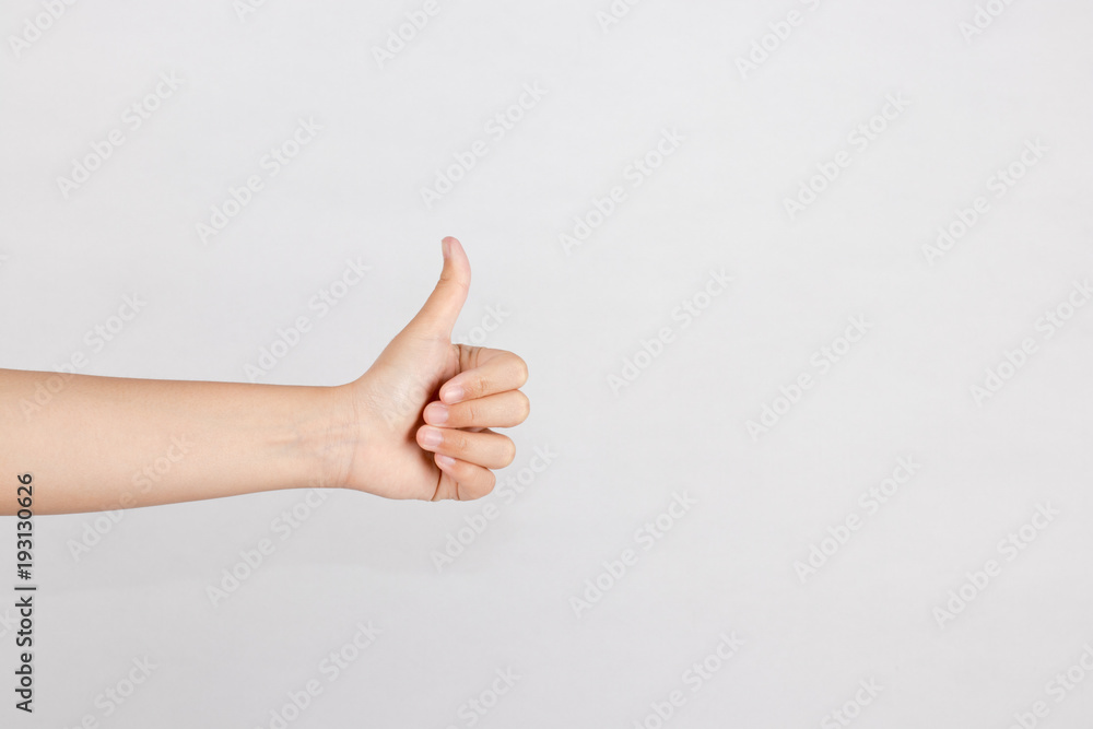 Right-hand show thumb finger. Hand sign for like, good, well, nice, awesomeness, and excellent isolated white background. Right-hand show thumb finger. Hand sign for like, good, well, nice, awesomeness, and excellent isolated white background.