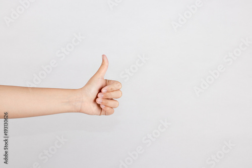 Right-hand show thumb finger. Hand sign for like, good, well, nice, awesomeness, and excellent isolated white background.