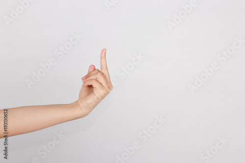 Right-hand show middle finger. Hand sign for bad, angry, moody, irritated, unlike, fuck you isolated white background.