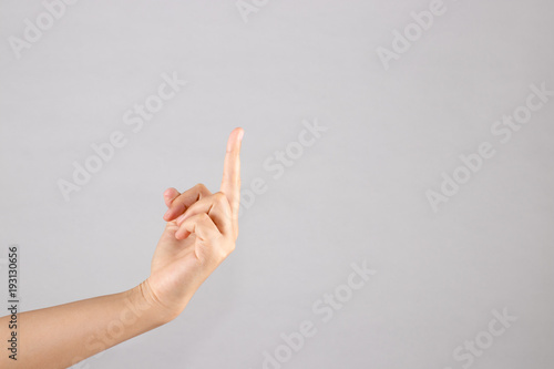 Right-hand show middle finger. Hand sign for bad, angry, moody, irritated, unlike, fuck you isolated white background.