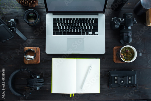 Audio / Video editing workspace office with mountain view. Photography and videography equipment.