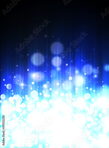 Blue glitter sparkles defocused rays lights bokeh radial vertical abstract background/texture.