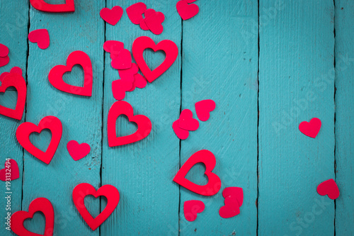 Valentine day background with red hearts, blue background top view photo