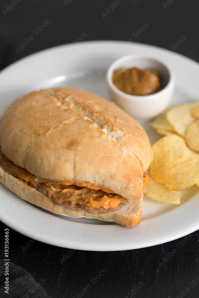 sandwich with meat and potato on plate sandwich with meat and potato on plate