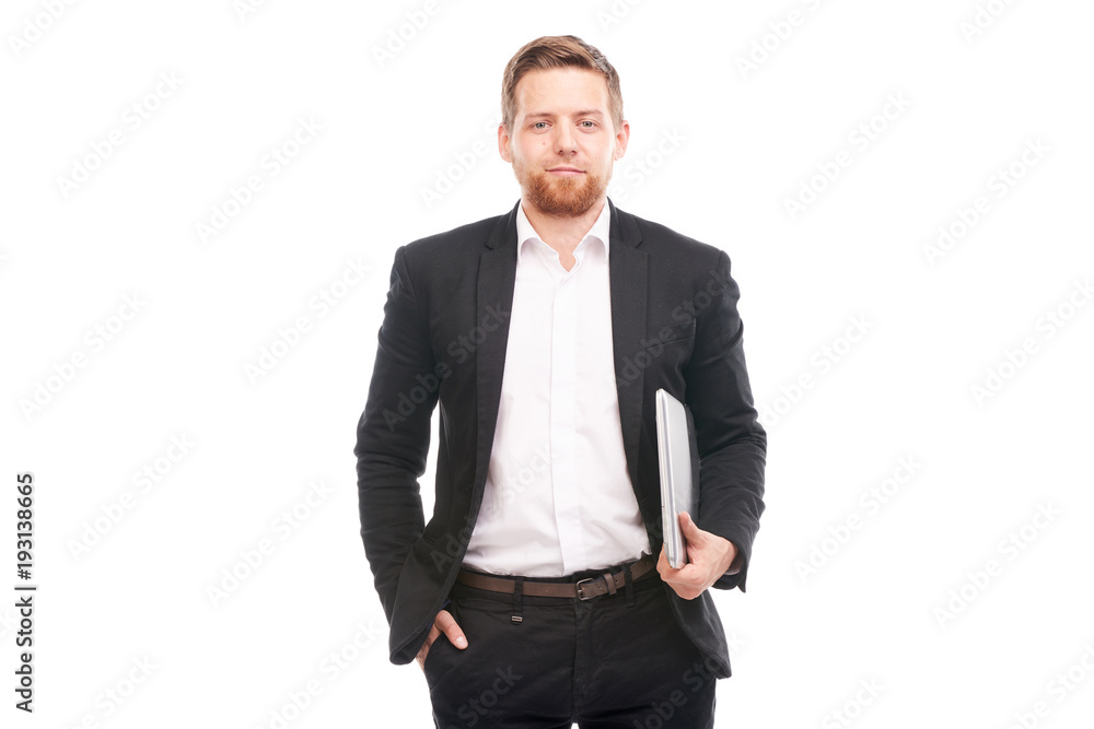 Studio portrait of young manager in suit holding laptop on white background Studio portrait of young manager in suit holding laptop on white background