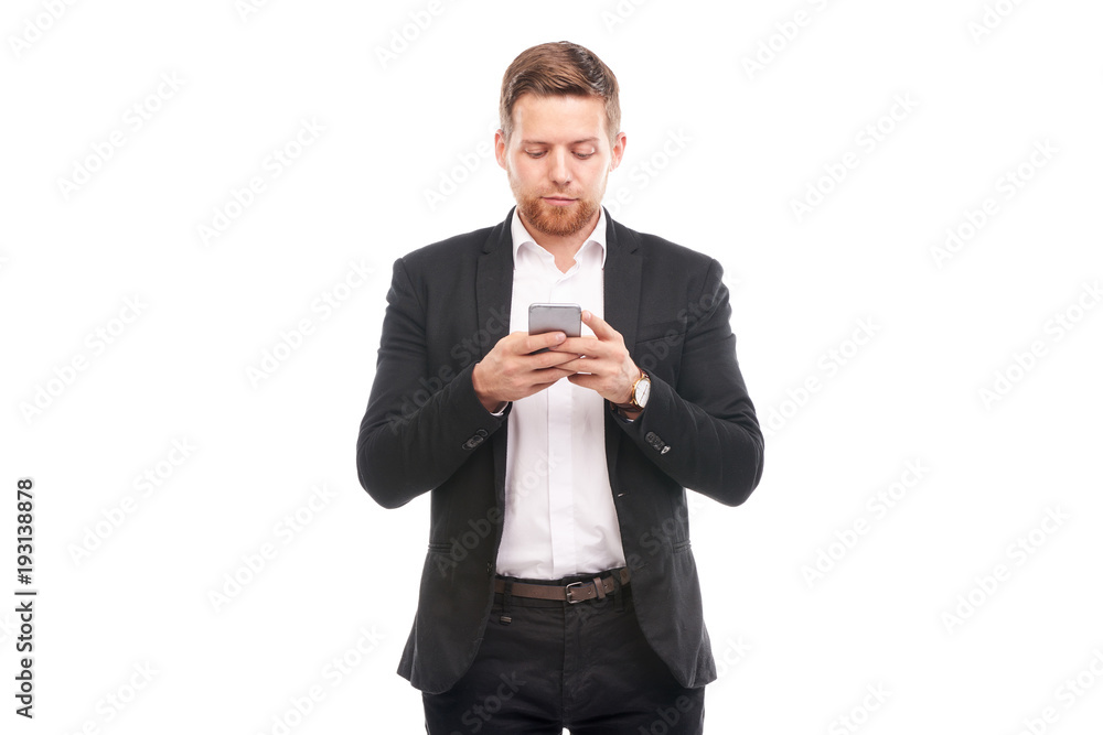 Portrait of young businessman with mobile phone on white background Portrait of young businessman with mobile phone on white background