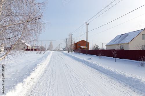 Road in the snow in the village