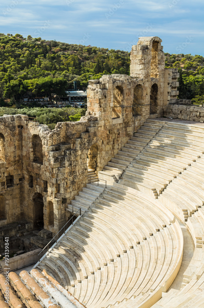 View from the Acropolis to the Ruins of ancient theater Odeon of Herodes Atticus in Athens, Greece
