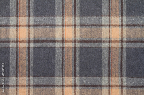 Flannel, cotton into the classic scottish cell as textile background in vintage style .