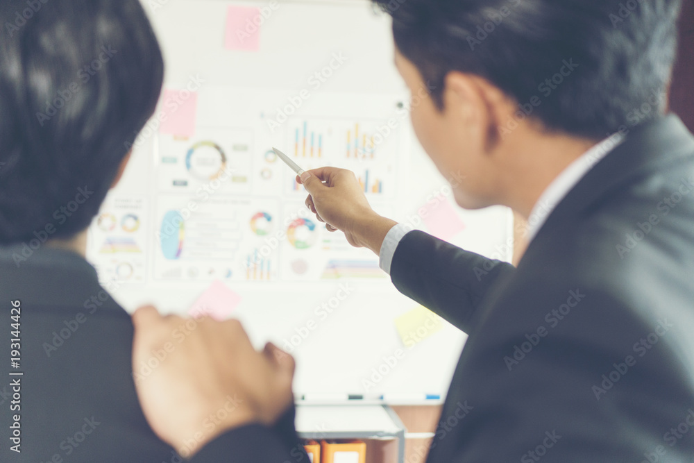 business couple working together on project at modern startup office business couple working together on project at modern startup office