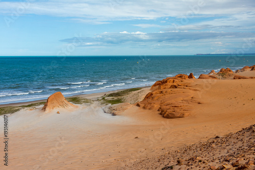 Canoa Quebrada, Brazil, January 2018 - View of windsurfing on the red beach