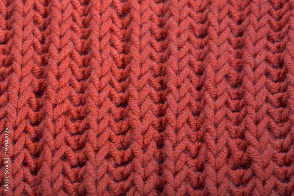 Texture of a knitted wool product, close up. Texture of a knitted wool product, close up.