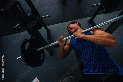 Gym workout accident or overtraining. Weight lifting accident. Accident on gym workout concept.