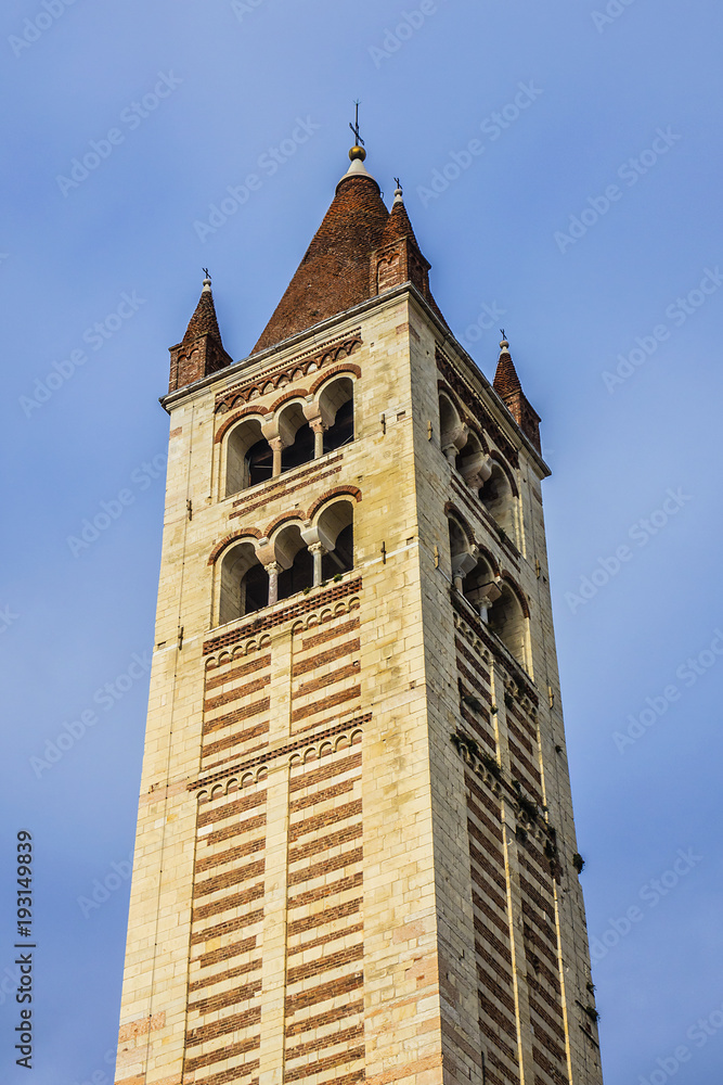 View of Basilica di San Zeno Maggiore bell tower in Verona. Basilica di San Zeno Maggiore - most important medieval church in Verona, was founded in V century and rebuilt in XII century. Italy.