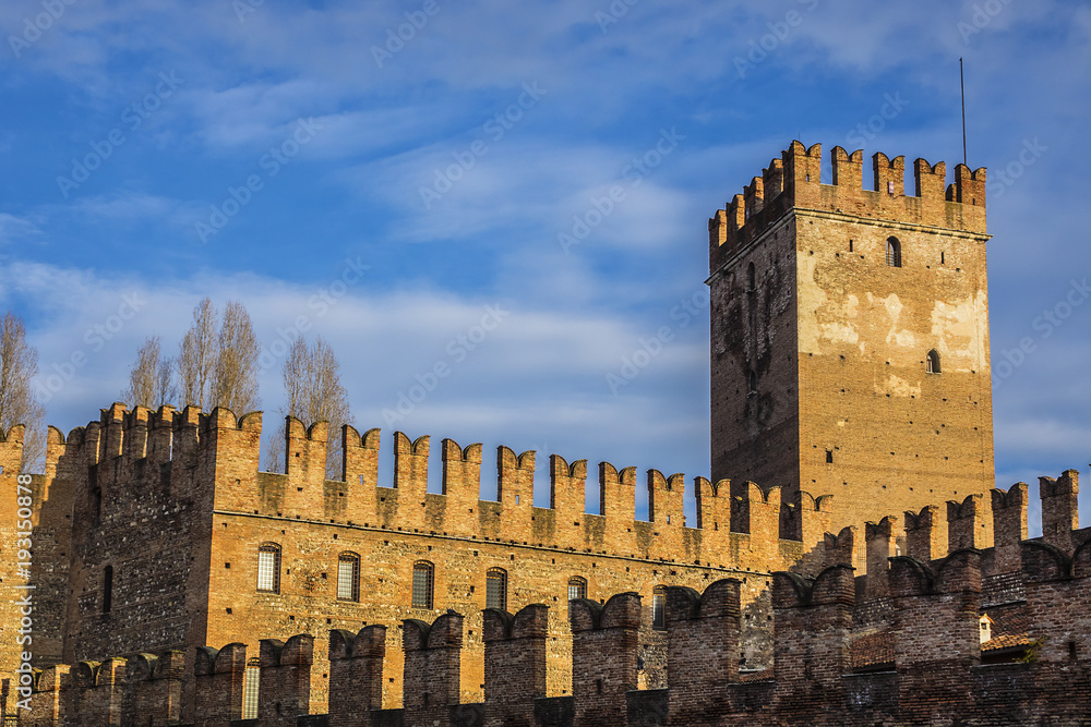 Architectural Details of Old Castle (Castelvecchio) at sunrise in Verona. Castelvecchio was constructed on banks of Adige by Cangrande II della Scala in 1354 in order to defend Verona people. Italy.