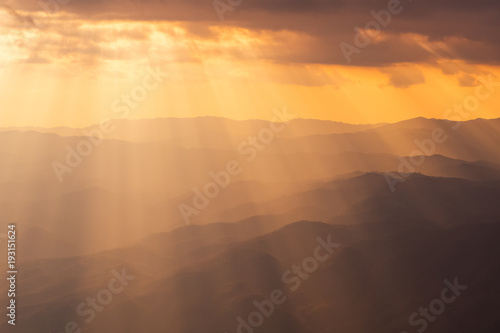 The rising sun, sky cloud sunrise abstract with mountain, background and fog © mr_gateway