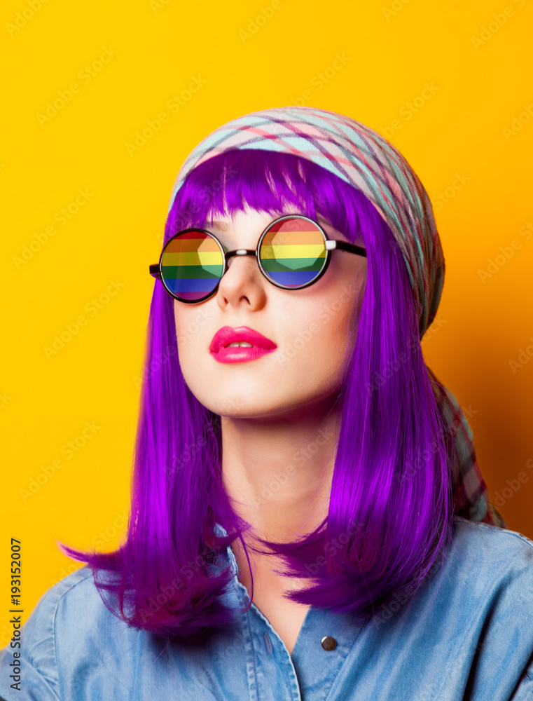 Young girl with purple hair and rainbow on suglasses Young girl with purple hair and rainbow on suglasses