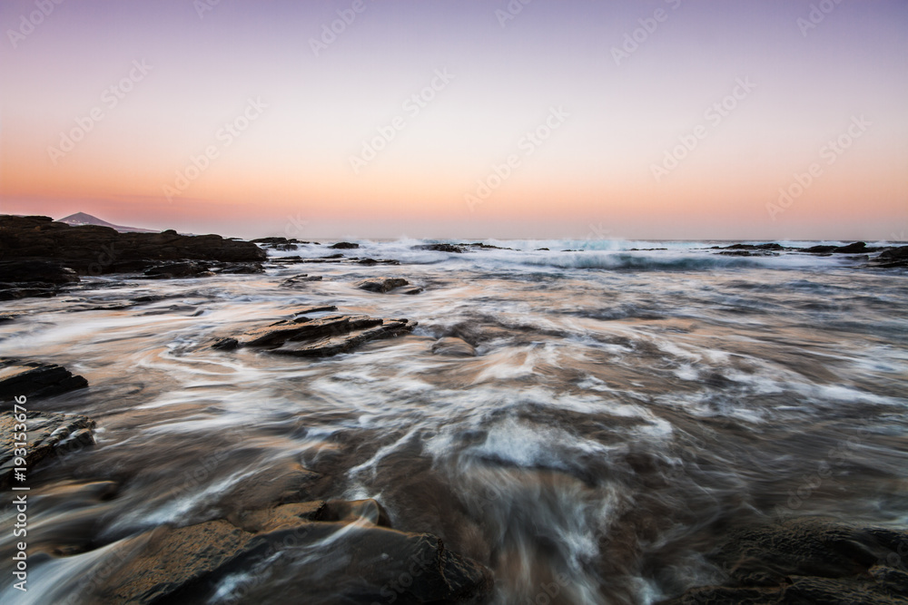 Colorful sunset seascape at Gran Canaria Island coast. Canary Islands, Spain Colorful sunset seascape at Gran Canaria Island coast. Canary Islands, Spain