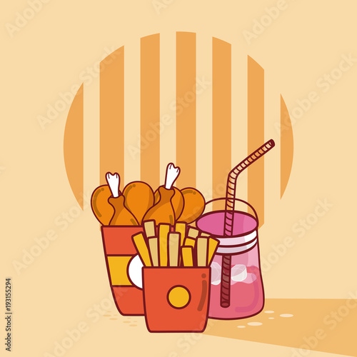 Chicken thighs in box with soda and french fries