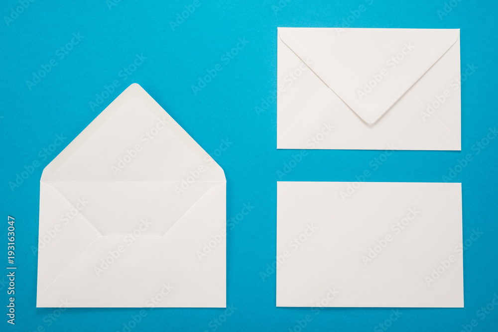 White envelopes on a blue background White envelopes on a blue background
