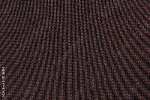 Background of wool. The cloth. Brown