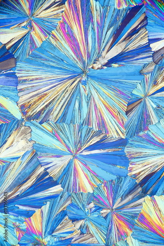 Crystals of a common painkiller acetylsalicylic acid, microscope image