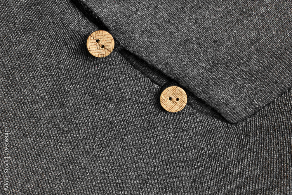 Background of wool. The cloth. Gray. Buttons Background of wool. The cloth. Gray. Buttons