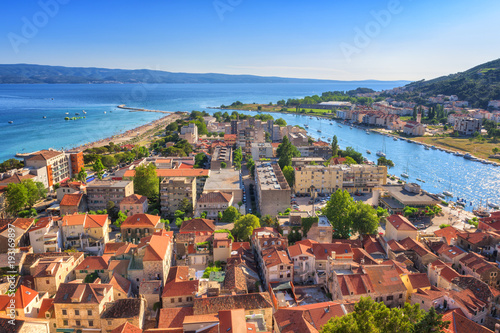 Omis old town, beautiful cityscape of mediterranean tourist resort at sunny summer day, panoramic view from Mirabella (Peovica) fortress, Dalmatia, Croatia