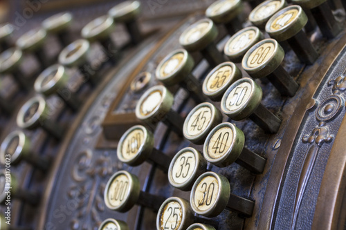 Antique cash register, buttons close up